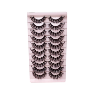Set van 10 paar professionele zwarte dikke kunstwimpers op een roze tray voor volume