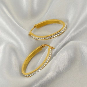 Oval 18k gold plated stainless steel hoop earrings with sparkling rhinestones on silk