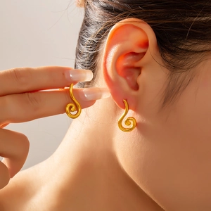 Polished gold-plated spiral shell stud earrings for women with minimalist curved design