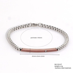 Detail view of bicolor stainless steel chain bracelet with rose gold bar and dimensions