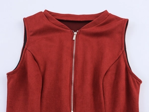 Detail of red faux suede sleeveless top with silver front zipper on white background