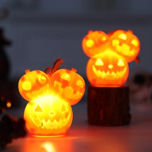 Lighted Halloween pumpkin stack decoration with Mickey silhouette and rope handle