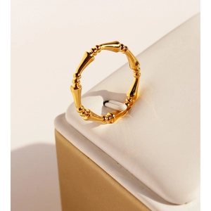 Classic bamboo style golden metal stackable ring with vintage minimalist texture