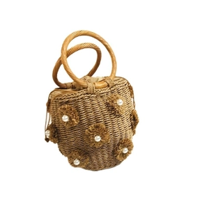 Handmade straw bucket bag with floral fringe and pearl beads with wooden handles