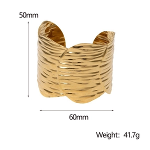 Detail of gold plated stainless steel cuff bracelet with hammer texture and measurements