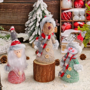 Charming knitted Christmas dolls featuring Santa, reindeer, and snowman for tree decoration