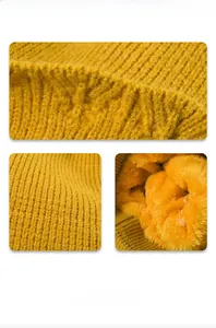 Détail du bonnet en maille jaune avec doublure en fourrure synthétique pour la chaleur