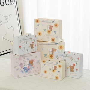Cartoon bear gift bags with sunflower patterns in various sizes for cute packaging