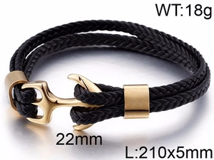 Close-up of black braided leather bracelet with golden stainless steel anchor clasp