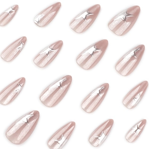 Sparkling rose gold almond press-on nails featuring 3D silver mirror star designs