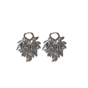 Exaggerated silver leaf tassel drop earrings with intricate layered metal fringe design