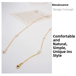 Detailed view of French style long necklace with freshwater pearls and golden chain