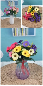 Detailed view of artificial cherry blossom bouquets in decorative vases for home decor