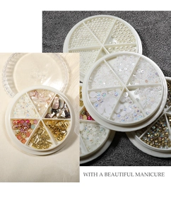 Detail view of 6-grid nail art kit with pearls, rhinestones and metal charms for DIY manicure