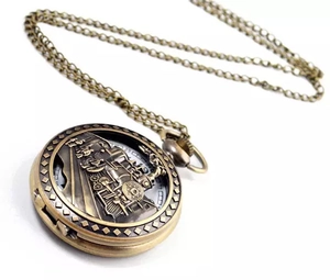 Detailed relief of a vintage steam train on a bronze quartz pocket watch pendant