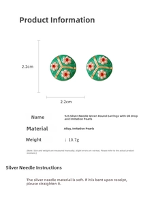Detailed view of green enamel pearl earrings with red accents and 925 silver posts