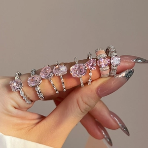 Elegant S925 sterling silver ring featuring pink ice flower cut zircon on model hand