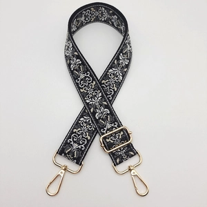 Ethnic style black and white embroidered bag strap with gold metal hooks and buckle