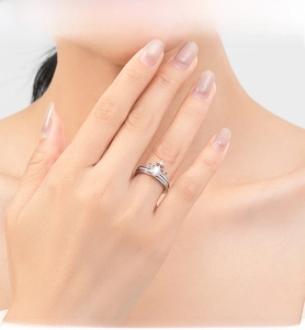 Detail shot of a s925 silver crown shaped double layer stacking ring with round CZ stone