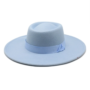 Light blue flat top wool felt fedora hat with wide brim and matching ribbon band