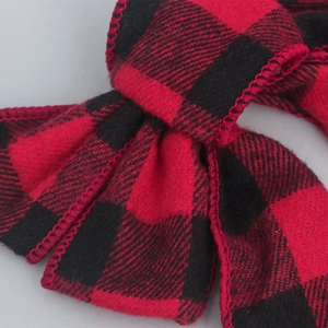 Red and black buffalo plaid ribbon with high-density stitched edges for Christmas decor