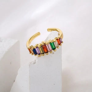 18K gold plated rainbow baguette zircon open ring on white stone base display
