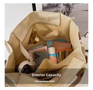 Internal view of beige canvas tote bag showing multiple pockets and large storage capacity