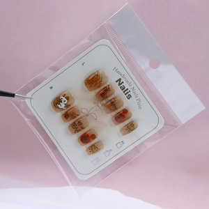 Handmade cute cat and fruit press-on nails set with Happy New Year theme on white card