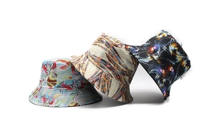 Detailed display of bucket hats with floral, geometric, and nebula print patterns