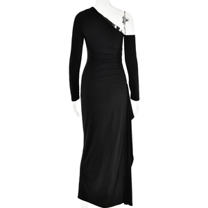 Detail of the high side slit and gathered waist on a black one-shoulder maxi dress