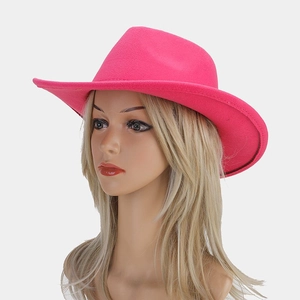 Detail shot of a hot pink wool felt cowboy hat on a display mannequin head