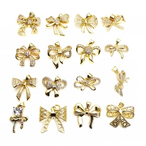 Elegant gold bow pendant necklace set with clear cubic zirconia stones for DIY jewelry