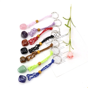 Handmade woven mesh keychain with various natural raw crystal stones and metal ring
