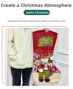 Detail of a large Christmas stocking featuring a 3D snowman and Merry Christmas print