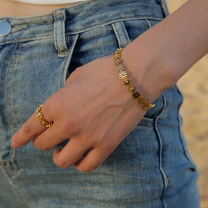 18K gold plated stainless steel daisy flower ring and bracelet set on model