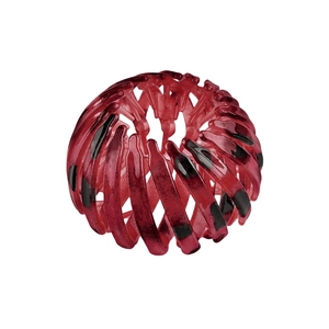 Detail of red leopard print nest hair clip with expandable resin claw structure