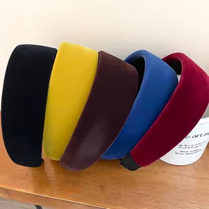 Wide velvet headbands in multi-color set showing plush fabric texture and soft finish