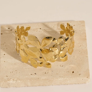 Elegant 18K gold-plated stainless steel C-shaped cuff bracelet with floral design