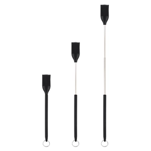 Three-piece black silicone spatula set with telescopic stainless steel handles and hooks
