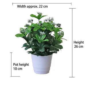 Artificial scindapsus plant in white ribbed pot with dimensions 26cm height and 22cm width