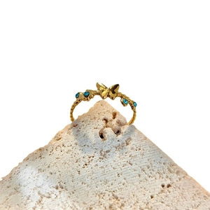 Elegant gold butterfly ring with blue rhinestones and adjustable open band for women