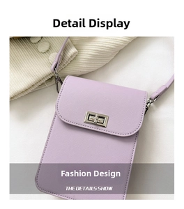 Detailed close-up of light purple crossgrain leather bag with silver metal twist lock