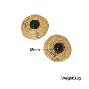 Detail showing vintage gold round earrings with black center and 18mm size measurement