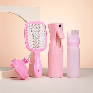Pink scalp massager brush set with spray bottle and hair coloring comb tools