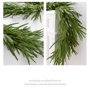 Close-up detail of realistic green PE Norfolk pine garland for Christmas decoration