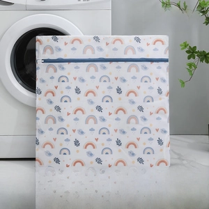 Detailed view of the extra large 60x60cm fine mesh laundry bag with rainbow print patterns