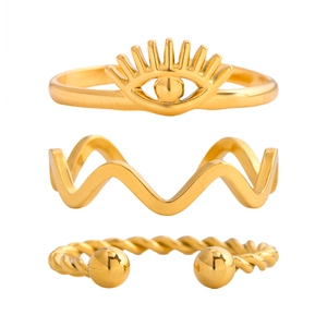 Ensemble de trois bagues en acier inoxydable plaqué or 18 carats avec motifs œil et vagues
