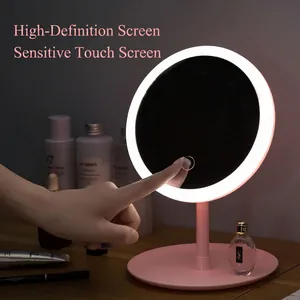 Pink desktop LED makeup mirror with round touch sensor and storage tray base