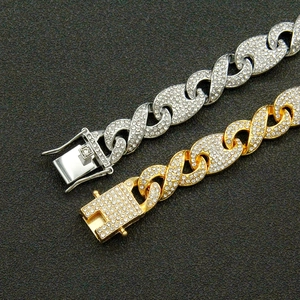 Iced out silver and gold infinity link bracelets with sparkling cubic zirconia pavé