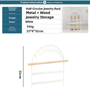 Detailed view of white metal jewelry stand with wood rods and dimension labels